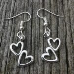 Silver Fashion Jewelry Drop Earring with a Drop Hearts